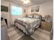 A comfortably furnished bedroom with carpet floors at 7943 Woodvine Cir, Tampa, FL 33615