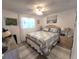Cozy bedroom with neutral tones and decor at 7943 Woodvine Cir, Tampa, FL 33615