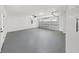 Spacious two-car garage with freshly painted walls, an automatic door, and ample storage space at 106 Corbett Rd, Lithia, FL 33547