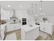 A kitchen featuring an island, stainless steel appliances, and pendant lighting at 106 Corbett Rd, Lithia, FL 33547