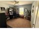 Home office features a ceiling fan and a window providing ample natural light at 13443 Graham Yarden Dr, Riverview, FL 33579