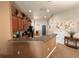 Spacious kitchen featuring wood cabinets and a breakfast bar countertop at 13443 Graham Yarden Dr, Riverview, FL 33579