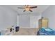 Nicely sized bedroom with ceiling fan, neutral carpet and double closet at 2332 Timbergrove Dr, Valrico, FL 33596