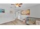 Bedroom with closet, laminated floor and an open door at 2332 Timbergrove Dr, Valrico, FL 33596