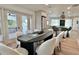 Elegant dining room with contemporary furniture and abundant natural light, perfect for gatherings at 320 Palm Ne Is, Clearwater Beach, FL 33767