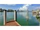 Scenic view from a private dock, showcasing beautiful waterfront scenery and calm waters at 320 Palm Ne Is, Clearwater Beach, FL 33767