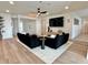 Modern living room featuring minimalist design, plush seating, and a spacious layout for comfortable entertaining at 320 Palm Ne Is, Clearwater Beach, FL 33767