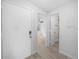 This is a bright entryway that opens to the living room and walk-in closet at 3811 N Oak Dr # E62, Tampa, FL 33611