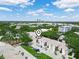 Exterior view of modern apartments with parking in front of the units at 3811 N Oak Dr # E62, Tampa, FL 33611