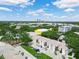 Exterior view of modern apartments with parking in front of the units at 3811 N Oak Dr # E62, Tampa, FL 33611