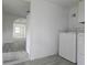 Convenient laundry area with washer and dryer hookups and open access to the house at 702 Hillsboro St, Plant City, FL 33563