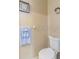 Clean and simple half bathroom with toilet and sink at 13473 Bruni Dr, Spring Hill, FL 34609