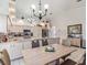 Eat-in kitchen with granite countertops and island at 13473 Bruni Dr, Spring Hill, FL 34609