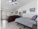 Cozy bedroom with comfortable bed and access to outdoor space at 13473 Bruni Dr, Spring Hill, FL 34609