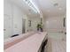 Bathroom boasts a large vanity and a luxurious soaking tub at 13473 Bruni Dr, Spring Hill, FL 34609