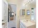 Bathroom with vanity and access to the backyard at 13473 Bruni Dr, Spring Hill, FL 34609