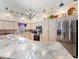 Bright kitchen with granite countertops and stainless steel appliances at 13473 Bruni Dr, Spring Hill, FL 34609