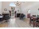 Spacious living room with hardwood floors and large windows at 13473 Bruni Dr, Spring Hill, FL 34609