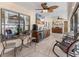 Outdoor kitchen and seating area overlooking the pool at 13473 Bruni Dr, Spring Hill, FL 34609