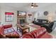Comfortable living room with fireplace and ample seating at 13473 Bruni Dr, Spring Hill, FL 34609