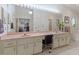 Elegant bathroom with double vanity and large mirror at 13473 Bruni Dr, Spring Hill, FL 34609