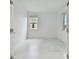Bright bedroom with two windows and tile floors at 18039 Cherished Loop, Bradenton, FL 34211