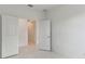 Spacious bedroom with white walls and tile flooring at 18039 Cherished Loop, Bradenton, FL 34211