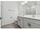 Modern bathroom with double vanity and grey tile flooring at 282 Via Anina Dr, Sarasota, FL 34243