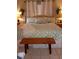Spacious primary bedroom with a king-size bed and seashell bedding at 1608 Bob O Link Dr, Venice, FL 34293