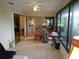 Spacious sunroom with access to living room and backyard at 1608 Bob O Link Dr, Venice, FL 34293