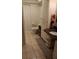 Clean bathroom with granite countertop and tiled floors at 1608 Bob O Link Dr, Venice, FL 34293