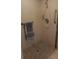 Walk-in shower with grab bars and tiled walls at 1608 Bob O Link Dr, Venice, FL 34293