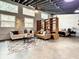 Open living area with contemporary furniture and large windows at 1480 17Th St, Sarasota, FL 34234