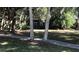 Dark gray house, partially obscured by trees at 1480 17Th St, Sarasota, FL 34234