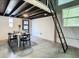 Modern dining area with loft and ladder at 1480 17Th St, Sarasota, FL 34234