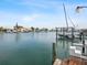 Stunning view of the waterway, boats, and neighboring waterfront homes at 11755 5Th E St, Treasure Island, FL 33706