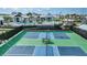 Two pickleball courts with a central bench at 4605 Sweet Retreat Run, Bradenton, FL 34211