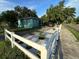 Front yard with white fence and landscaping at 2415 E 21St Ave, Tampa, FL 33605