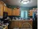 Kitchen with wood cabinets and appliances at 2415 E 21St Ave, Tampa, FL 33605