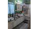 Bathroom with double vanity and bathtub at 2415 E 21St Ave, Tampa, FL 33605