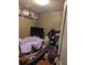 Small bedroom with a bed and tv at 2415 E 21St Ave, Tampa, FL 33605