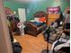 A bedroom with a double bed and wooden furniture at 2415 E 21St Ave, Tampa, FL 33605