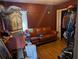 Living room with a brown leather couch at 2415 E 21St Ave, Tampa, FL 33605