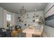 Bright home office with a large desk and built-in shelving at 289 Vistera Blvd, Nokomis, FL 34275