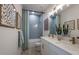 Modern bathroom with double vanity and a bathtub at 289 Vistera Blvd, Nokomis, FL 34275