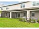 Screened patio with grassy yard, offering a private outdoor space at 5439 Tripoli Dr, Palmetto, FL 34221