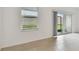 View of backyard from living room sliding glass doors at 5439 Tripoli Dr, Palmetto, FL 34221