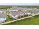 Aerial perspective of townhouses under construction, highlighting community layout at 5439 Tripoli Dr, Palmetto, FL 34221