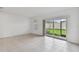 Spacious living area with sliding glass doors leading to the patio at 5439 Tripoli Dr, Palmetto, FL 34221