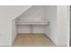 Under-stair built-in desk or storage area with tile flooring at 5439 Tripoli Dr, Palmetto, FL 34221